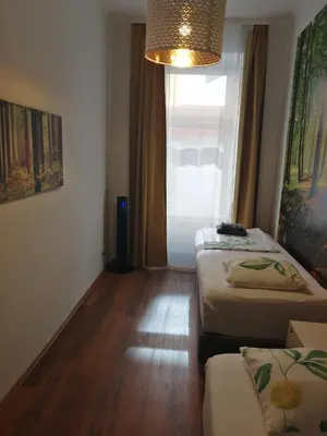 Ein Bett oder Betten in einem Zimmer der Unterkunft Apartments near Schönbrunn Palace