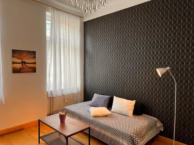 Ein Bett oder Betten in einem Zimmer der Unterkunft Studio & Apartments near Reumannplatz