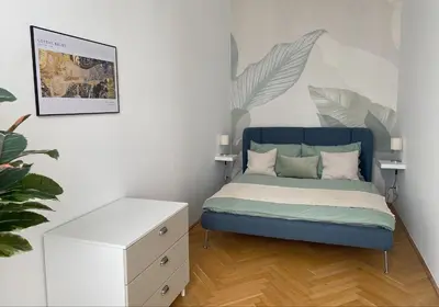 Ein Bett oder Betten in einem Zimmer der Unterkunft Cosy apartment in Mariahilf close to citycenter