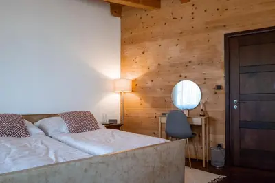Ein Bett oder Betten in einem Zimmer der Unterkunft Strohlehm'zhaus