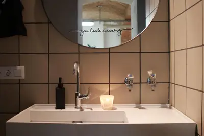 Ein Badezimmer in der Unterkunft Studio in City Center