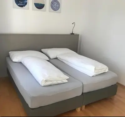 Ein Bett oder Betten in einem Zimmer der Unterkunft Schindler