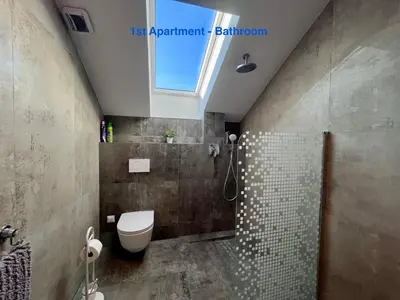 Ein Badezimmer in der Unterkunft Cozy Apartment near Vienna Airport - tax included and Self CheckIn