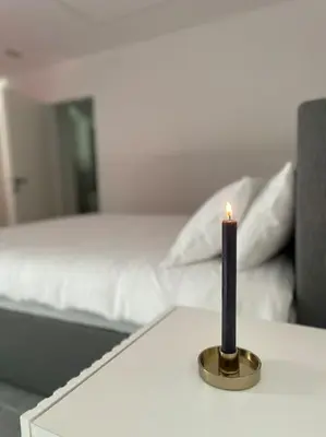 Ein Bett oder Betten in einem Zimmer der Unterkunft Hagenauer House