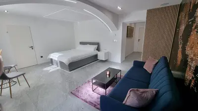 Ein Bett oder Betten in einem Zimmer der Unterkunft Hagenauer House