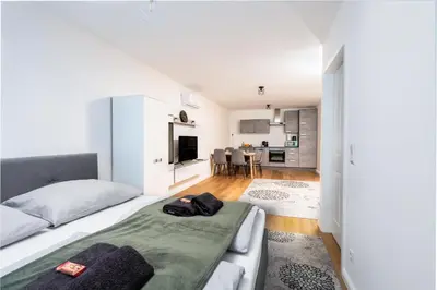 Ein Bett oder Betten in einem Zimmer der Unterkunft Family Apartment