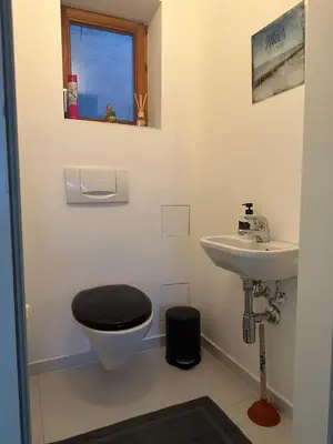Ein Badezimmer in der Unterkunft Klimatisiertes Dachgeschoss City Apartment in Zentrum Wiens