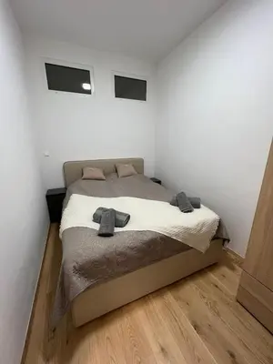 Ein Bett oder Betten in einem Zimmer der Unterkunft Cozy Homes Vienna