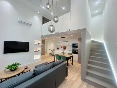 TV/Unterhaltungsangebot in der Unterkunft Zeus Design Loft Apartments Braunhirschen
