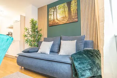 Ein Sitzbereich in der Unterkunft Charming 1BR, Steps from Reumannplatz U1