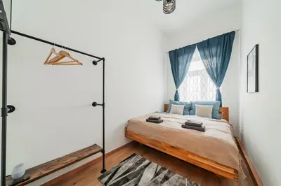 Ein Bett oder Betten in einem Zimmer der Unterkunft 3 Bedrooms - 74sqm - 10 Min. Inner City