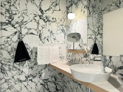 Ein Badezimmer in der Unterkunft ARCOTEL AQ Wien