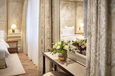 Ein Bett oder Betten in einem Zimmer der Unterkunft Hotel Zur Wiener Staatsoper