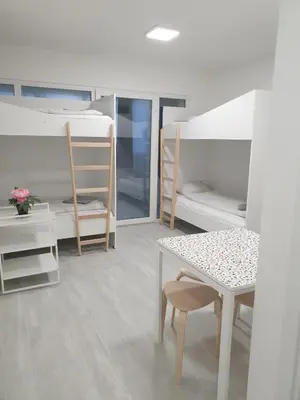 Ein Bett oder Betten in einem Zimmer der Unterkunft Business Westbahnhof R