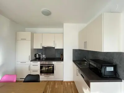 Küche/Küchenzeile in der Unterkunft Penthouse near Central Station with free parking