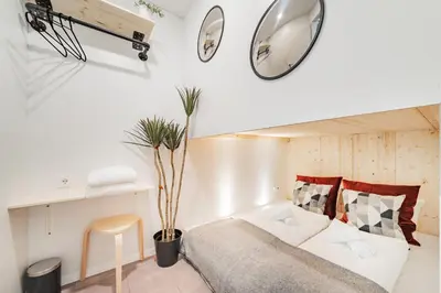 Ein Bett oder Betten in einem Zimmer der Unterkunft CUBES by Tegetthoff