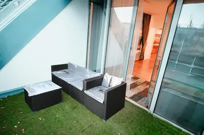 Ein Sitzbereich in der Unterkunft Vienna Shopping Center 12 Apartment