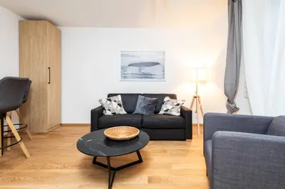 Ein Sitzbereich in der Unterkunft Zoder Apartments