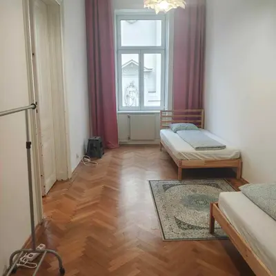 Ein Bett oder Betten in einem Zimmer der Unterkunft Large 4 room apartment in the center of Vienna