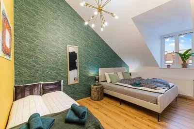 Ein Bett oder Betten in einem Zimmer der Unterkunft „Royal Loft View“ Rooftop Nähe Stadtzentrum