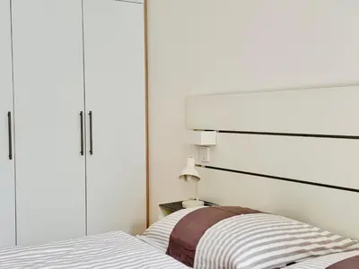 Ein Bett oder Betten in einem Zimmer der Unterkunft MOMENTIC Apartments