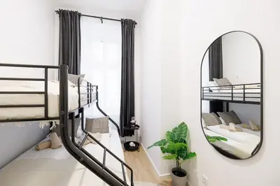 Ein Bett oder Betten in einem Zimmer der Unterkunft Central City Style Rooms by Home2