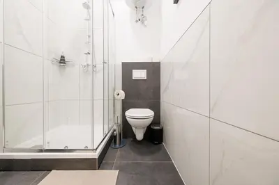 Ein Badezimmer in der Unterkunft Central City Style Rooms by Home2