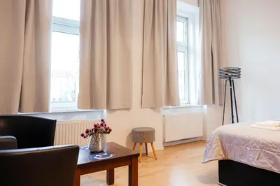 Ein Bett oder Betten in einem Zimmer der Unterkunft LAX Apartments