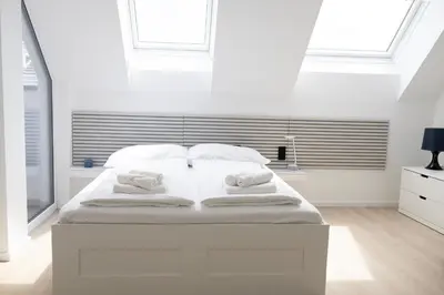 Ein Bett oder Betten in einem Zimmer der Unterkunft SI apartments - Smart Inn