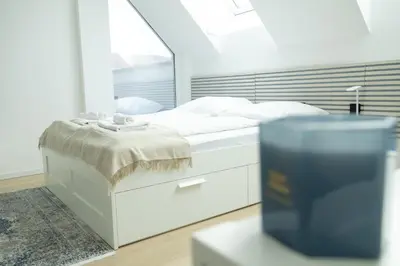 Ein Bett oder Betten in einem Zimmer der Unterkunft SI apartments - Smart Inn