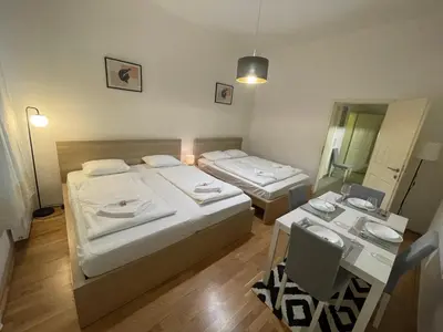 Ein Bett oder Betten in einem Zimmer der Unterkunft Cozy 5-Person apartment in Vienna 2