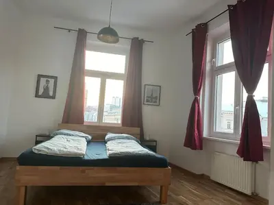 Ein Bett oder Betten in einem Zimmer der Unterkunft Klimatisierter Wiener Altbauflair im Zentrum Wiens