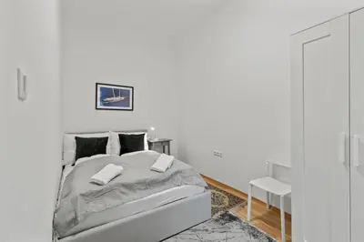 Ein Bett oder Betten in einem Zimmer der Unterkunft Modern Apartment close to Center - 2BR