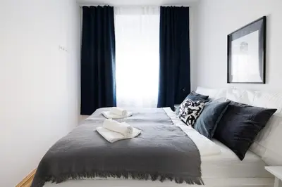 Ein Bett oder Betten in einem Zimmer der Unterkunft Modern Central City Apartment - Netflix 2 Bedroom