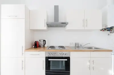 Küche/Küchenzeile in der Unterkunft Modern Central City Apartment - Netflix 2 Bedroom