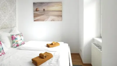 Ein Bett oder Betten in einem Zimmer der Unterkunft Stylish, central 2-room flat near Augarten
