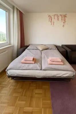Ein Bett oder Betten in einem Zimmer der Unterkunft Big Family Apartment