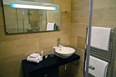 Ein Badezimmer in der Unterkunft Vienna Suites