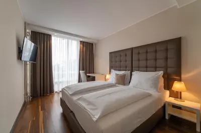 Ein Bett oder Betten in einem Zimmer der Unterkunft Pakat Residences