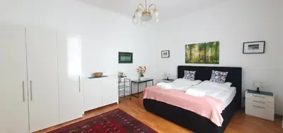 Ein Bett oder Betten in einem Zimmer der Unterkunft Suite in imperial design, central location