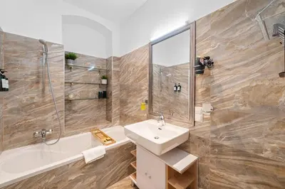 Ein Badezimmer in der Unterkunft Traum-Wohnung, 63m², TOP Öffi-Anbindung, Smart-TV.