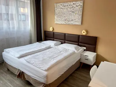 Ein Bett oder Betten in einem Zimmer der Unterkunft Stylish home near city center
