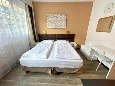 Ein Bett oder Betten in einem Zimmer der Unterkunft Stylish home near city center