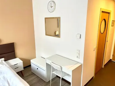 Ein Bett oder Betten in einem Zimmer der Unterkunft Stylish home near city center