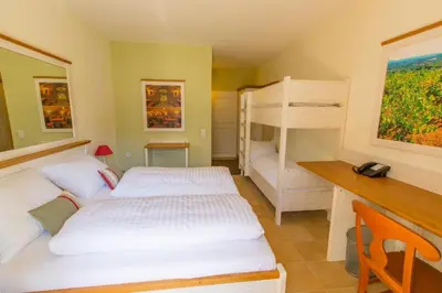 Ein Bett oder Betten in einem Zimmer der Unterkunft Hotel Elia