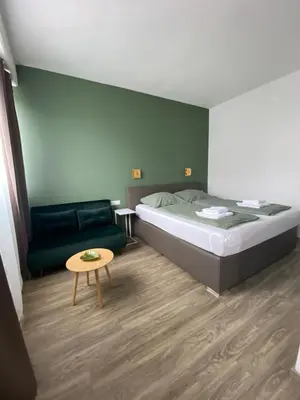 Ein Bett oder Betten in einem Zimmer der Unterkunft bookVienna 