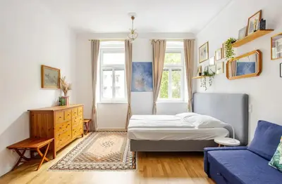 Ein Bett oder Betten in einem Zimmer der Unterkunft Gemütliche Wohnung nur 15 Minuten ins Stadtzentrum
