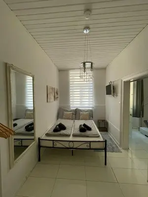 Ein Bett oder Betten in einem Zimmer der Unterkunft City-Refugium Mariahilfer Straße Stilvolles Wohnen am Puls der Stadt T4