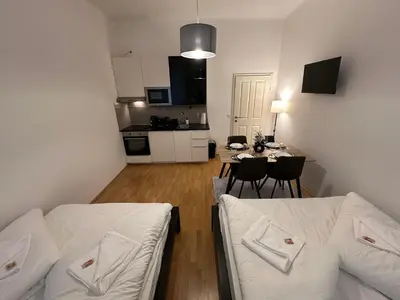 Ein Bett oder Betten in einem Zimmer der Unterkunft Cozy-5-Person apartment in Vienna 5