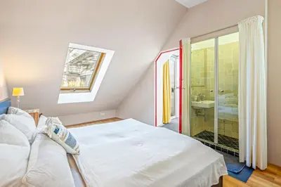 Ein Bett oder Betten in einem Zimmer der Unterkunft 360° View Loft 2